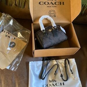 Coach Black Mini Bag with Gold Accents